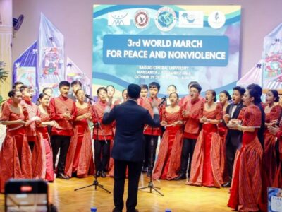 The BCU Chamber Choir performs "Heal the World" by Michael Jackson during the 3rd World March for Peace and Nonviolence at the Baguio Central University, held on October 21, 2024, at Margarita J. Fernandez Hall.